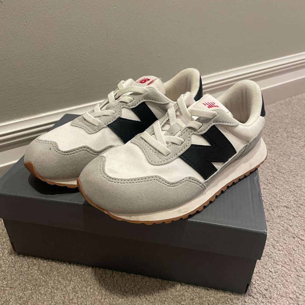 Boys New Balance Classic White and Black Sneakers